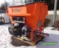 Preview: HILLTIP tractor spreader IceStriker 600 TR in Orange with 3 point hitch, pre-wet system and pure brine deployment